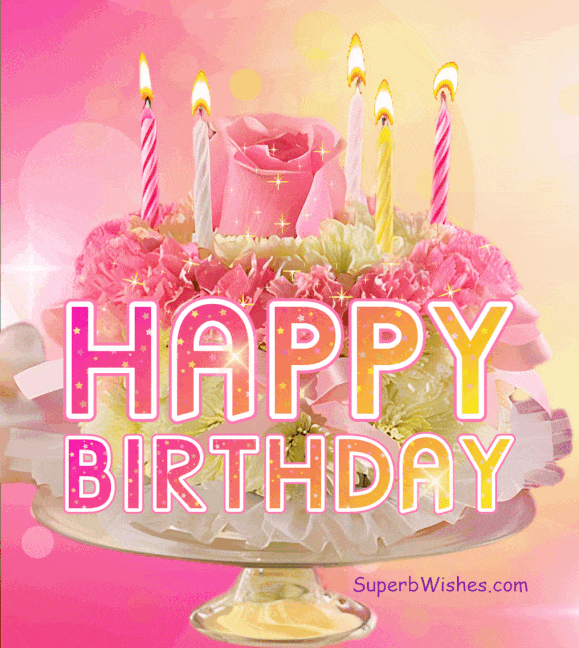 Pink Floral Birthday Cake With Lit Candles GIF